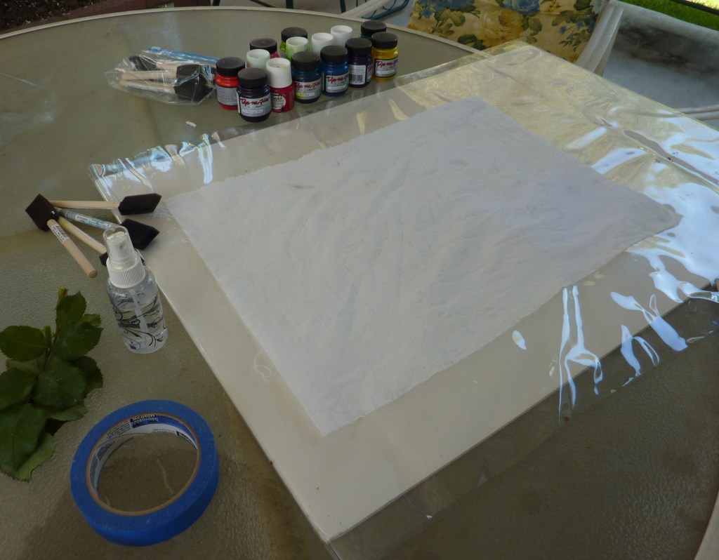 Prepared work surface and wet fabric
